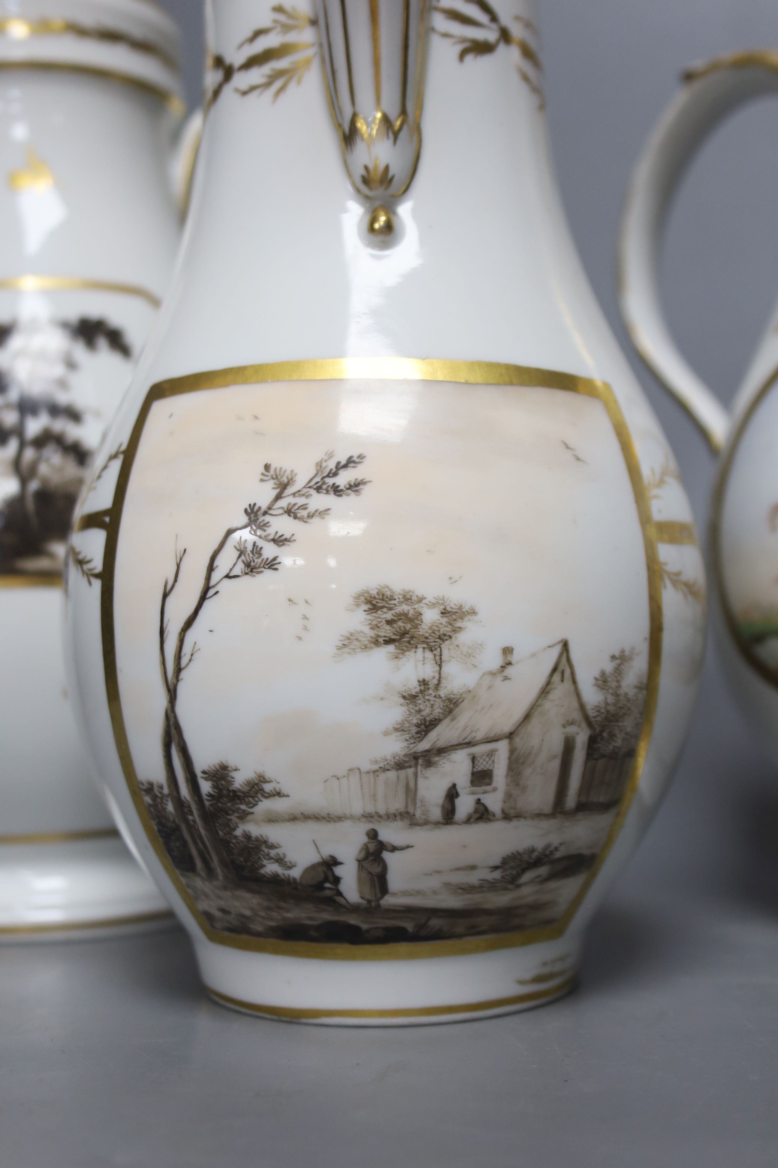 Three 19th century French gilt painted porcelain coffee pots, two without covers, tallest 28cm